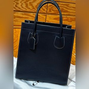 Coach Cashin Carry Tote 29.     ( Used in pristine condition )